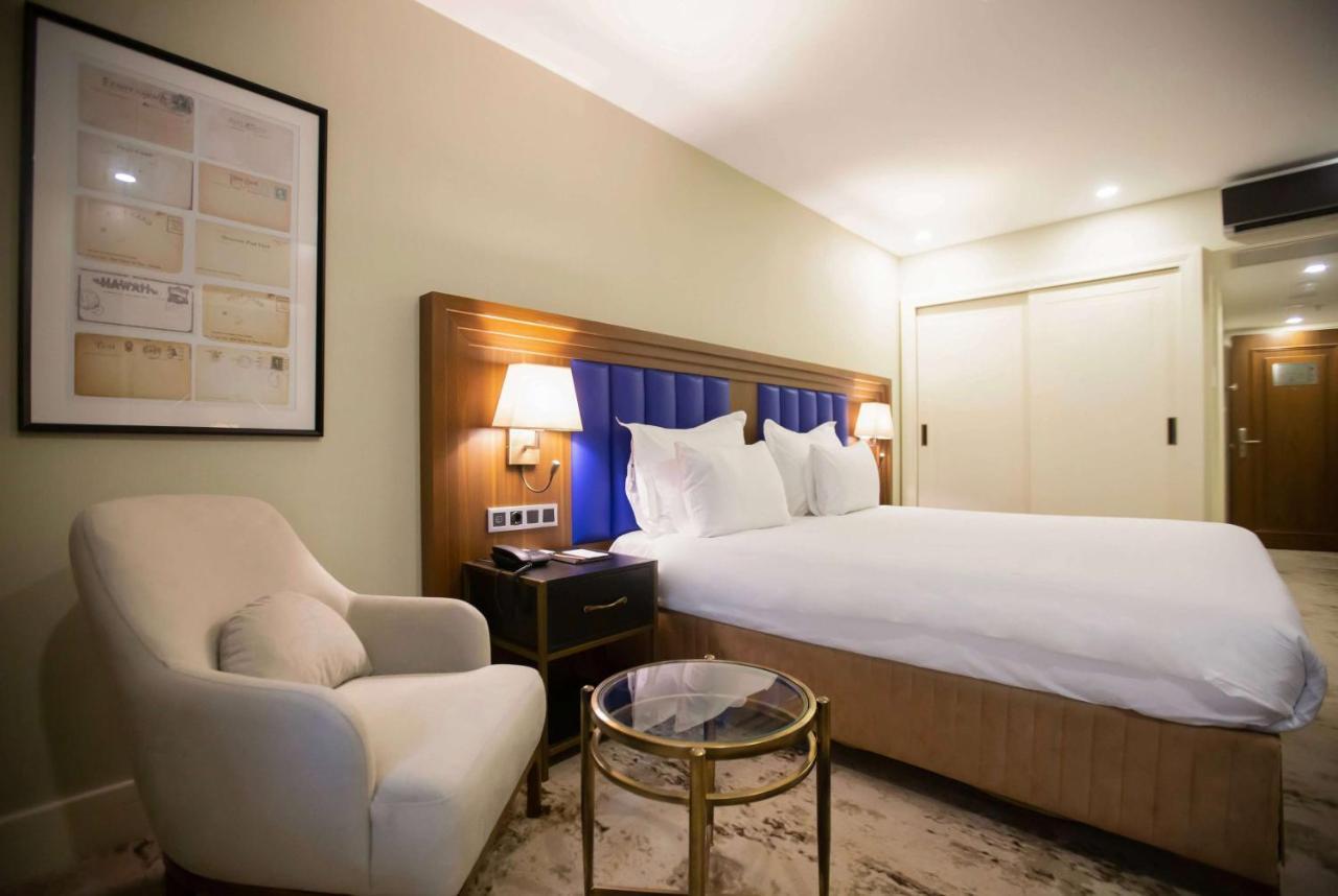 Ramada Plaza Sultanahmet Hotel Isztambul Kültér fotó A bedroom at the hotel